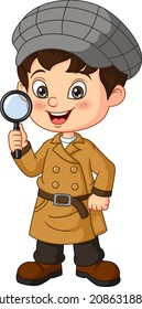 Cute detective boy holding a magnifying glass