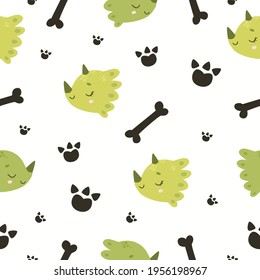 Cute dinosaur. Adorable dinosaur face. Dino seamless pattern with bone silhouettes and paw prints.