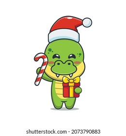 Cute dinosaur holding christmas candy and gift. Cute christmas cartoon illustration.