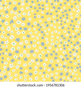 Cute ditsy daisy seamless repeat pattern. Random placed small vector flowers all over print with yellow background.