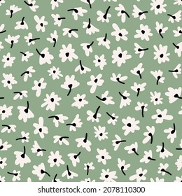 Cute ditsy daisy with stem seamless repeat pattern. Random placed, vector millefleurs all over surface print on sage green background.