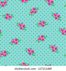 cute ditsy floral over dotty background