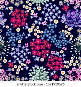 Cute ditsy pattern. Seamless print with colorful wildflowers. Template for textile design, cards, gift wrappings.