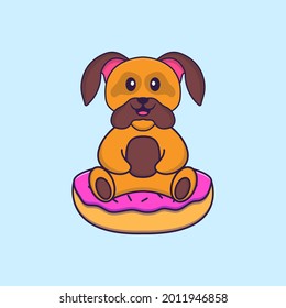 Cute dog is sitting on donuts. Animal cartoon concept isolated. Can used for t-shirt, greeting card, invitation card or mascot.