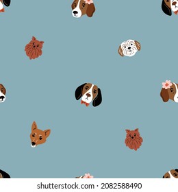 Cute dogs seamless pattern. Breeds of dog pattern design in hand-drawn style.
Vector animal print on turquoise background 