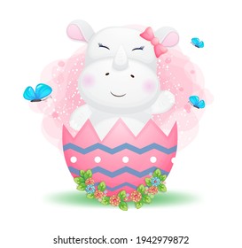 Cute doodle baby rhino girl in the decorative easter egg. Baby shower Premium Vector