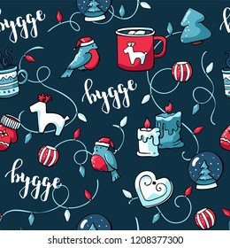 Cute doodle christmas elements. Vector hand drawn seamless pattern with hygge lettering and cozy things candles, christmas toy, garlands and hot chocolate with marshmallow. Danish living concept.