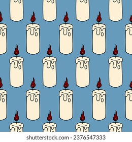 Cute doodle illustration in flat style, seamless pattern of burning candles on a blue background. Witch items, witchcraft.