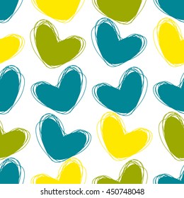 Cute doodle seamless pattern. Heart hand drawings. Background for creativity. Blue, green, yellow