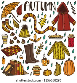 Cute doodle set with hand drawn autumn elements. Concept of cozy autumn.