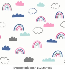 Cute doodle vector pattern with rainbows and clouds. Sky seamless background with hand drawn weather icons.