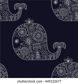 Cute doodle whale. Vector seamless pattern with hand drawn whale with floral ornament and bubbles. Childish background with animals silhouette with flowers and dots. On black backdrop.