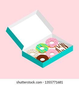 Cute doughnuts in turquoise green paper box on pastel pink background