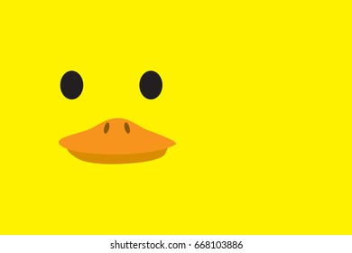 Cute duck head on yellow background with copy space