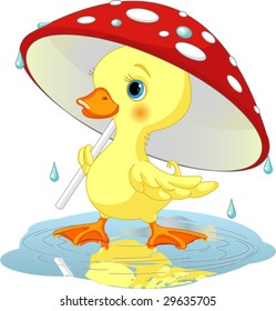 Cute duckling  wearing rain gear under  mushroom umbrella