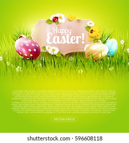 Cute Easter background with colorful eggs and paper label on green background