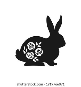 Cute Easter black and white bunny silhouette. Spring bunny with rose flowers inside. Black and white Easter bunny isolated on white background. 