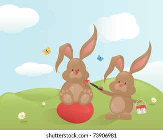 Cute Easter bunnies with a big red egg