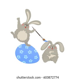 Cute Easter bunnies coloring egg. Fun illustration of rabbits with Happy easter text isolated on white background.