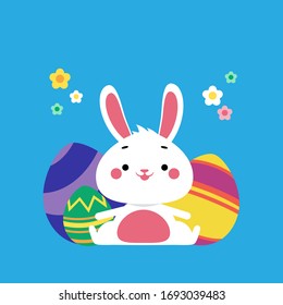 Cute easter bunny celebrating holiday sitting around festive eggs
