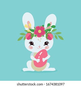 Conejo de Pascua con huevos y flores.