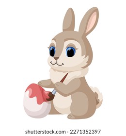 Cute Easter Bunny painting Easter egg. Vector cartoon illustration of a rabbit for Easter cards, posters, banners and other design. Isolated on white background. Stock vector