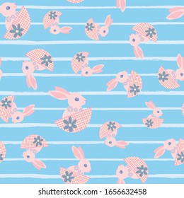 Cute Easter bunny seamless vector pattern background. Decorated rabbit folk art illustration. Scandinavian style baby animals in baskets on striped backdrop. Christian spring celebration concept.