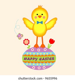 A cute easter chick on the colorful easter egg.