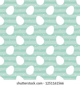 Cute easter eggs and dots on pastel, mint green striped seamless pattern background.