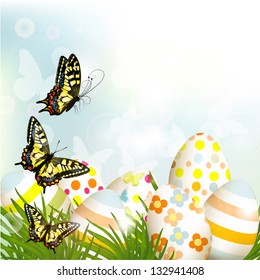 Cute Easter outdoor background with clear space, grass and eggs