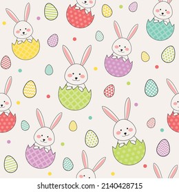 Cute Easter rabbits and eggs. Design of a seamless texture. Vector