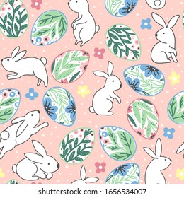 Cute Easter seamless pattern of bunnies, eggs and spring flowers on a pink background. Hand-drawn vector texture.