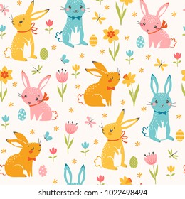 Cute Easter seamless pattern of multicolored  bunnies, Easter eggs, spring flowers, butterflies and dragonflies. 