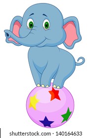 Cute elephant standing on a colorful ball