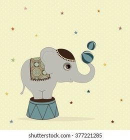 Cute elephant with two balls