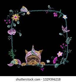 Cute embroidery  frame with fantasy flowers and unicorn puppy . Vector embroidered design for wearing design.