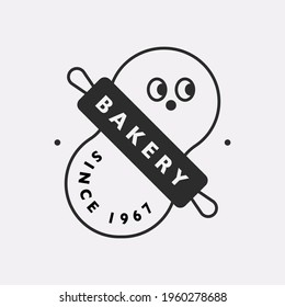 Cute face character bakery logo. Black color hipster design.