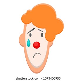 Cute face of a sad clown that cries with red curly hair, red nose