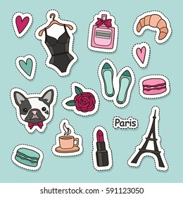 Cute fashion patch badges set: hearts, Eiffel tower, flower, macaroons, lingerie, lipstick, bulldog, perfume, shoes, croissant, cup of coffee. Paris romantic design. Vector trendy illustration.