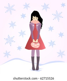 Cute fashionable girl standing in the snow