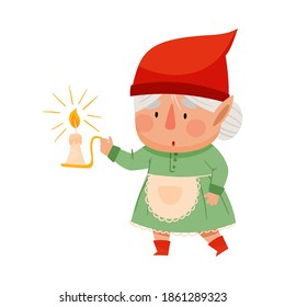 Cute Female Gnome Character In Apron And Red Pointed Hat Carrying Lighting Candle Vector Illustration