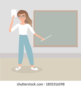 Cute female teacher with glasses, she points to a chalkboard and holding a sheet of paper