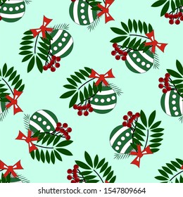 Cute festive pattern with rowan branch and green leaves with christmas ball on a beautiful background.