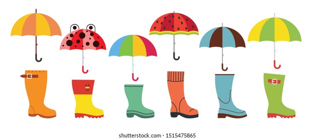 Cute flat umbrellas and rubber boots. Autumn wear concept