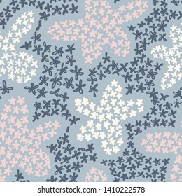 Cute floral background. Botanical seamless pattern made of small daisy flowers forming the flower petals. Simple colorful plain illustration. 
