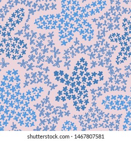 Cute floral background. Botanical seamless pattern made of small daisy flowers forming the flower petals and stars. Simple plain illustration. 