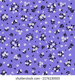 Cute floral background. Vector seamless pattern with ditsy flowers. Vintage botanical surface pattern design. Cottage core wallpaper