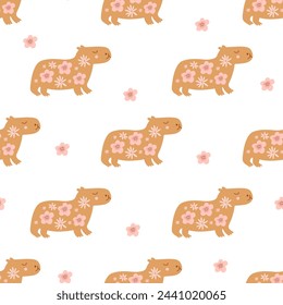 Cute floral Capybara seamless pattern. Summer repeat background with cute animal, pink flowers. Vector childish wallpaper, textile design, print, gift paper, wrapping, fabric.