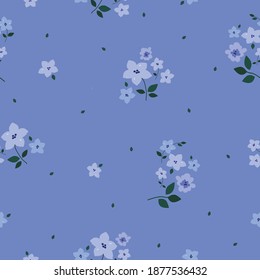 cute floral pattern of abstract flowers. Printing color in a flower. Seamless vector texture. Beautiful pale blue flowers. Blue background. elegant template for fashionable prints.