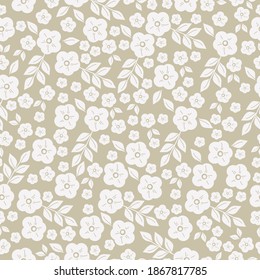 Cute floral pattern in flowers. Seamless vector texture. Elegant template for fashionable prints. The print is white flowers and leaves. The ivory backgroun